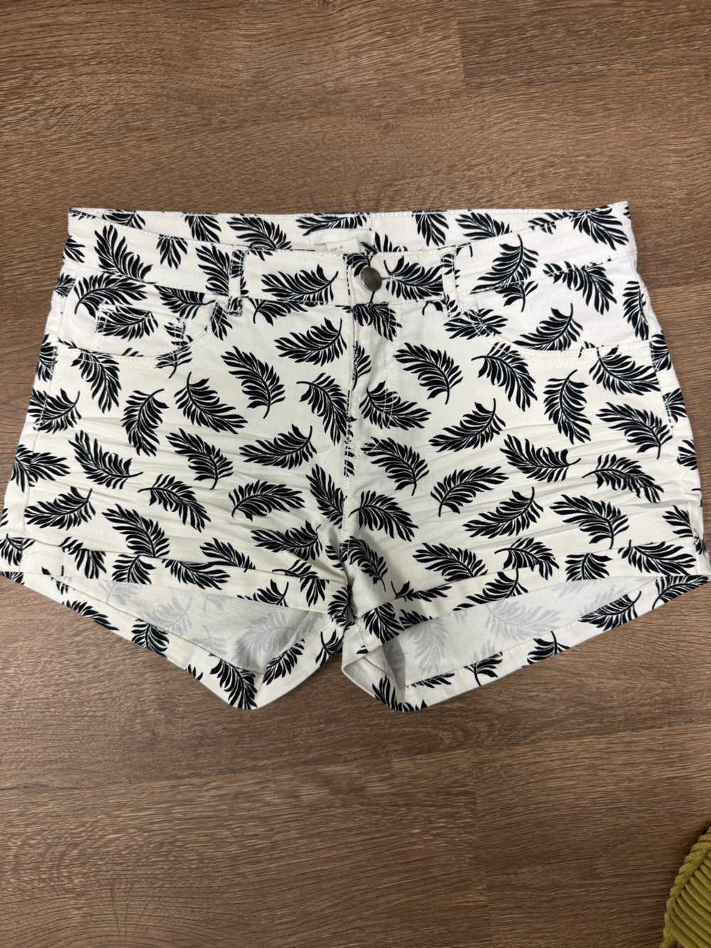 H&M White Denim Shorts with Black Leaf Print